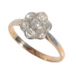 A DIAMOND DAISY RING