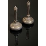 A PAIR OF INDIAN SILVER AND PARCEL-GILT 'SUHARE' (WINE FLASKS)