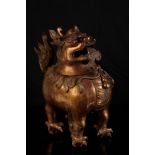 A CHINESE GILT BRONZE LION INCENSE-BURNER