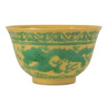 A CHINESE YELLOW-GROUND GREEN ENAMLLED 'DRAGON' BOWL