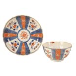 A 19TH CENTURY IMARI DECORATED PORCELAIN TEABOWL AND SAUCER