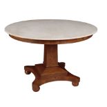 AN OAK AND MARBLE TOPPED CENTRE TABLE