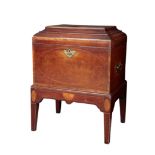 AN EDWARDIAN MAHOGANY CELLARETTE OF GEORGIAN DESIGN