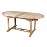 A CONTEMPORARY TEAK GARDEN TABLE