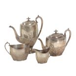 A FOUR PIECE SILVER TEA SERVICE BY JOSIAH WILLIAMS & CO