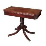 A REGENCY MAHOGANY TEA TABLE