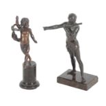 A BRONZE FIGURE OF A DANCING BOY