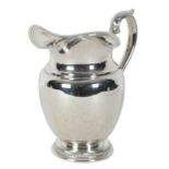 AN AMERICAN STERLING SILVER WATER JUG