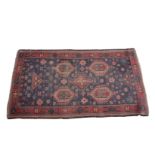 AN ANTIQUE TURKISH RUG