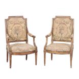 A PAIR OF LOUIS XVI STYLE GILTWOOD ARMCHAIRS