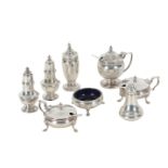 A GEORGE V SILVER FIVE PIECE CRUET SET