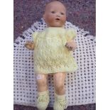 AN ARMAND MARSEILLES BISQUE HEADED BABY DOLL 351/7K