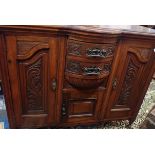 AN EDWARDIAN WALNUT SIDEBOARD