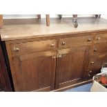 AN ARTS & CRAFTS STYLE OAK SIDEBOARD