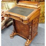 A VICTORIAN WALNUT DAVENPORT DESK WITH FOUR SIDE DRAWERS