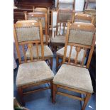 A SET OF SIX EDWARDIAN ARTS & CRAFTS DINING CHAIRS