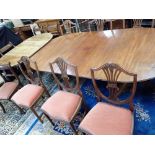 A REGENCY STYLE MAHOGANY TWIN PEDESTAL DINING TABLE