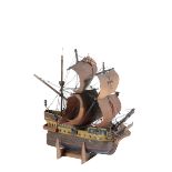 A 1930'S WOODEN MODEL OF AN EXPLORATION ERA SHIP