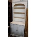 A PAINTED LIBRARY BOOKCASE, WITH CUPBOARD BELOW