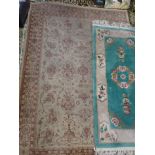 A CREAM GROUND PERSIAN STYLE RUG