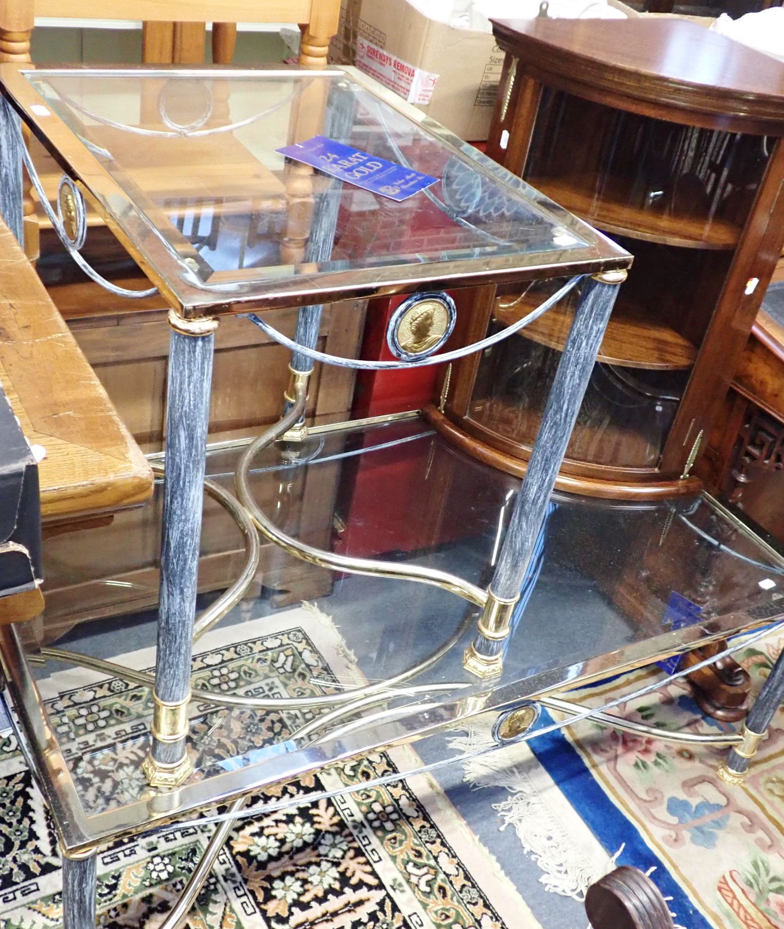 TWO GLASS-TOPPED GILDED METAL TABLES