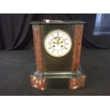 A FRENCH MARBLE MANTLE CLOCK