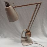AN ADJUSTABLE COUNTERBALANCED DESK LAMP BY HADRILL & HORSTMANN
