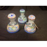 A GROUP OF THREE MILLEFIORI GLASS INKWELL PAPERWEIGHTS