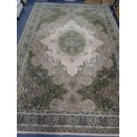 A LARGE CREAM AND GREEN WILTON 'TABRIZ' CARPET