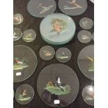 A SERIES OF HAND-PAINTED GLASS TABLE MATS