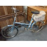 A VINTAGE RALEIGH TRIUMPH FOLDING BICYCLE