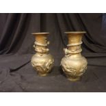 A PAIR OF ORIENTAL BRASS DRAGON VASES