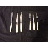 A SET OF SIX SILVER AND MOTHER OF PEARL DESSERT KNIVES AND FORKS