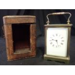 A FRENCH BRASS CASED STRIKING CARRIAGE CLOCK