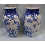 A PAIR OF JAPANESE BLUE AND WHITE VASES