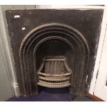 A VICTORIAN CAST IRON FIREPLACE INSERT