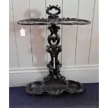 A CAST IRON UMBRELLA STAND