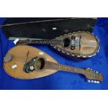 A 'STRIDENTE, NAPOLI' MANDOLIN, WITH MOTHER-OF-PEARL DECORATION