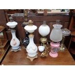 A COLLECTION OF VICTORIAN OIL LAMPS
