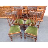 FOUR 1920S OAK 'JACOBETHAN' STYLE DINING CHAIRS
