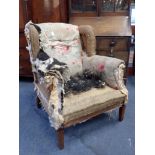 A LATE VICTORIAN HOWARD STYLE WING ARMCHAIR