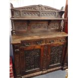 AN EARLY VICTORIAN ELIZABETHAN REVIVAL CHIFFONIER