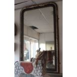 A FRENCH OVERMANTEL MIRROR, WITH BLACK AND GILT MOULDED FRAME