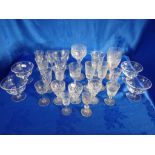 A COLLECTION OF CUT AND ENGRAVED GLASSES AND DISHES