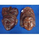 TWO INDONESIAN CARVED HARDWOOD HEADS