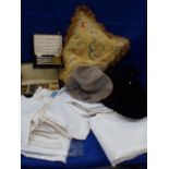 A QUANTITY OF LINENS, LADIES HATS, CASED CUTLERY
