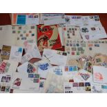 A COLLECTION OF STAMPS, INCLUDING FIRST DAY COVERS