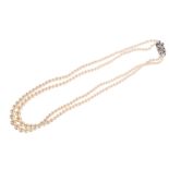 A DOUBLE STRAND GRADUATED SIMULATED PEARL NECKLACE
