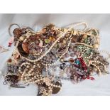 A QUANTITY OF BEAD NECKLACES AND COSTUME JEWELLERY