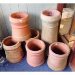A CHIMNEY POT 64cm HIGH, TWO SMALLER PAIRS